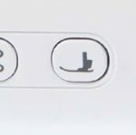 Taste zum Heben und Senken des Nähfußes